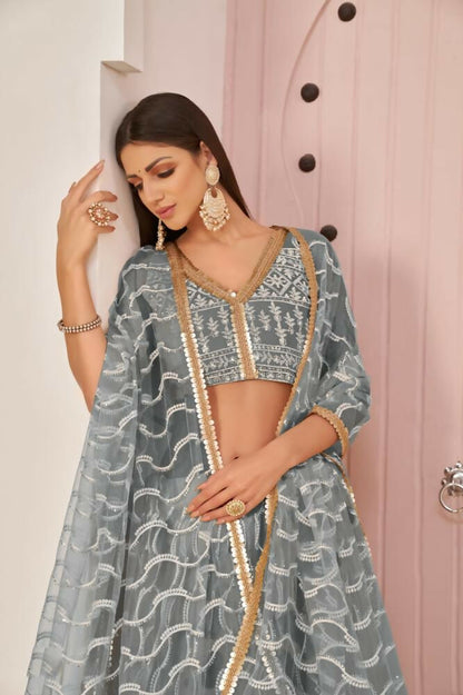 Aastha Fashion Gray Butterfly Net White Cotton Thread Work, Zari Work And Sandwich Sequence Work Embroidery Wedding Wear Lehenga Choli