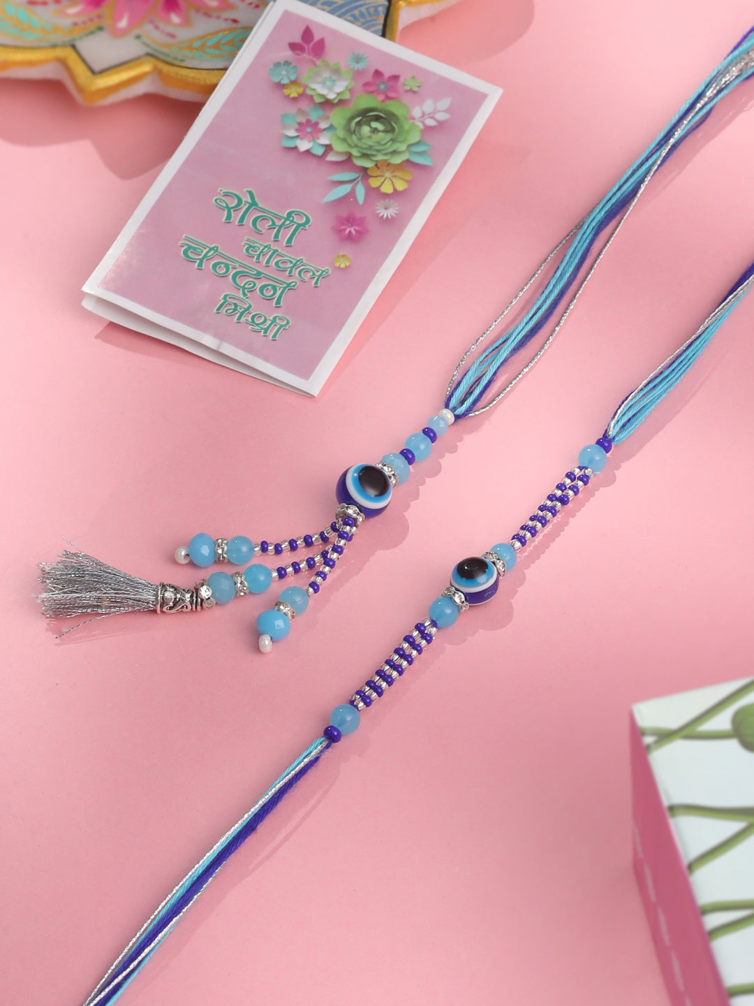 NVR Set of 2 Blue Evil Eye Artificial Beads Bhaiya Bhabhi Rakhi with Roli Chawal Chandan & Mishri