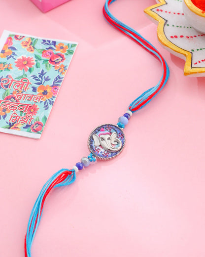NVR Men Red & Blue Ganesh Ji Thread Rakhi with Roli Chawal Chandan & Mishri