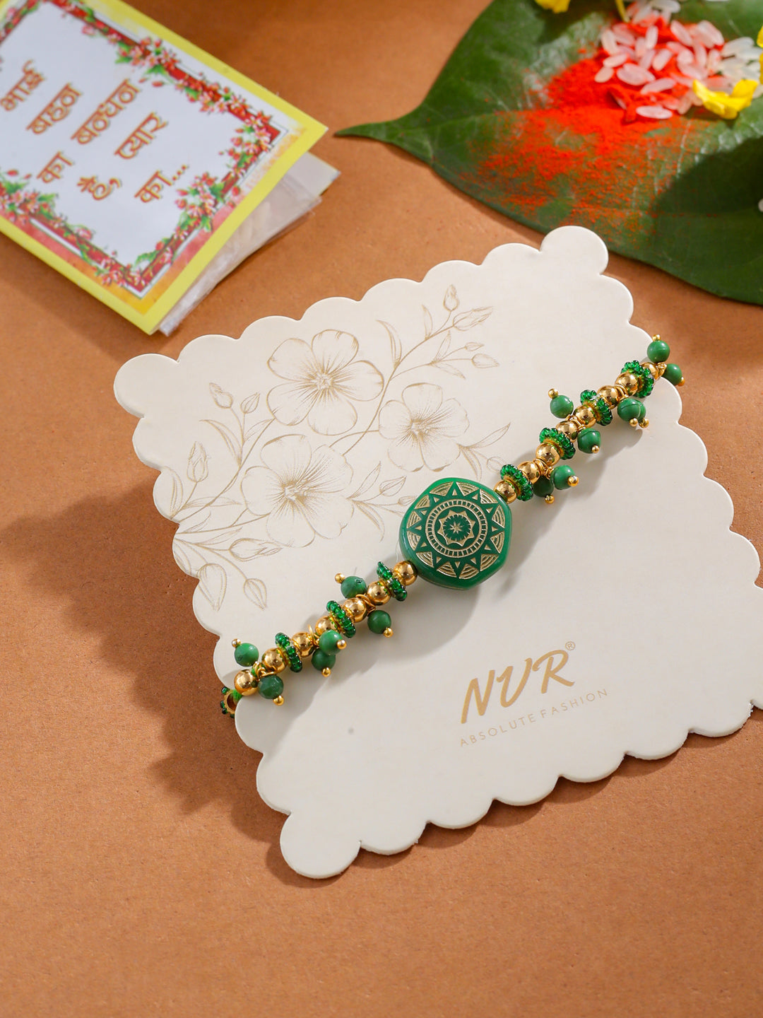 NVR Men Green Artificial Beads Round Shape Thread Rakhi with Roli Chawal Chandan & Mishri
