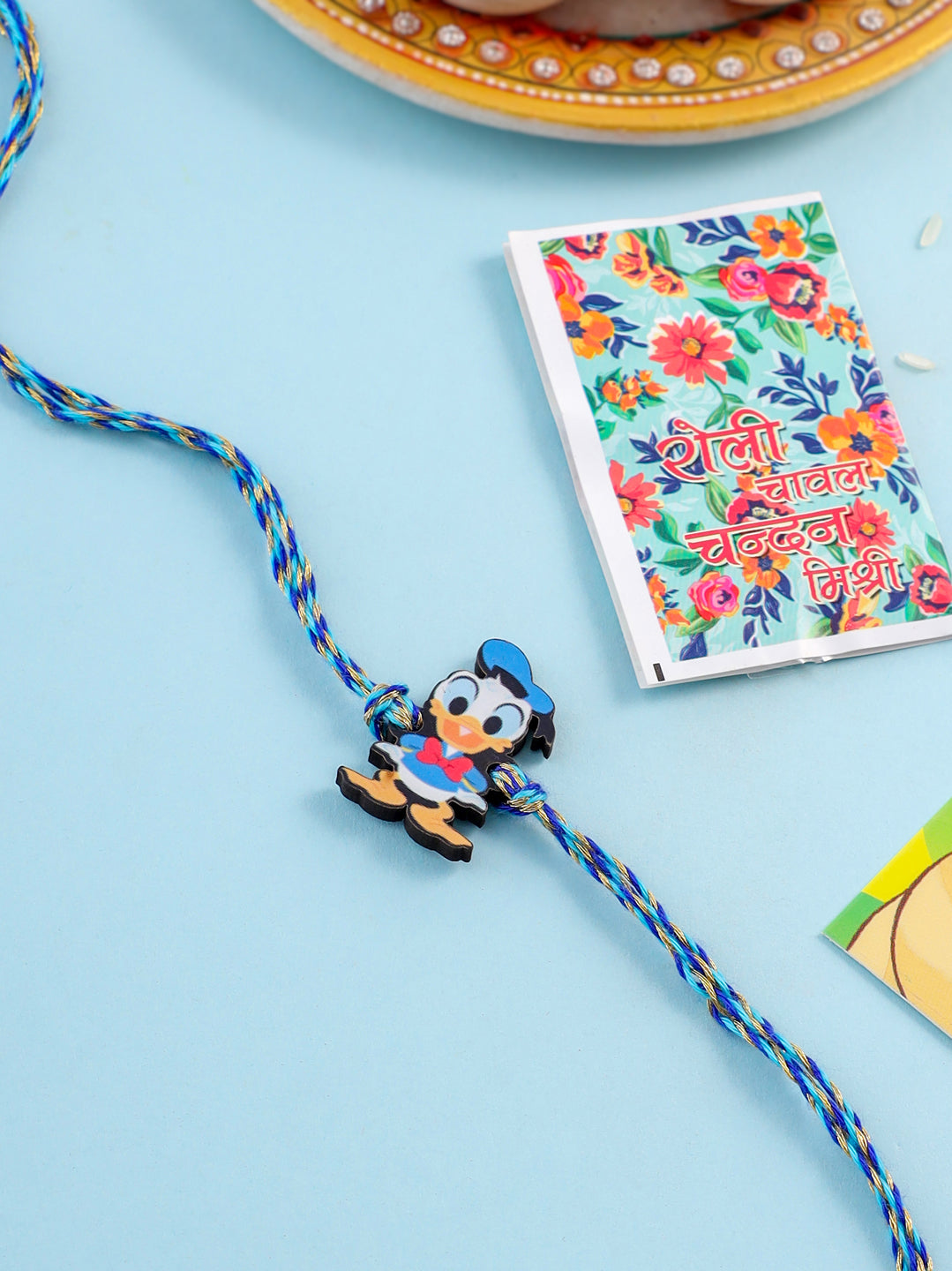NVR Stylish Blue Cartoon Character Kids Rakhi with Roli Chawal Chandan & Mishri