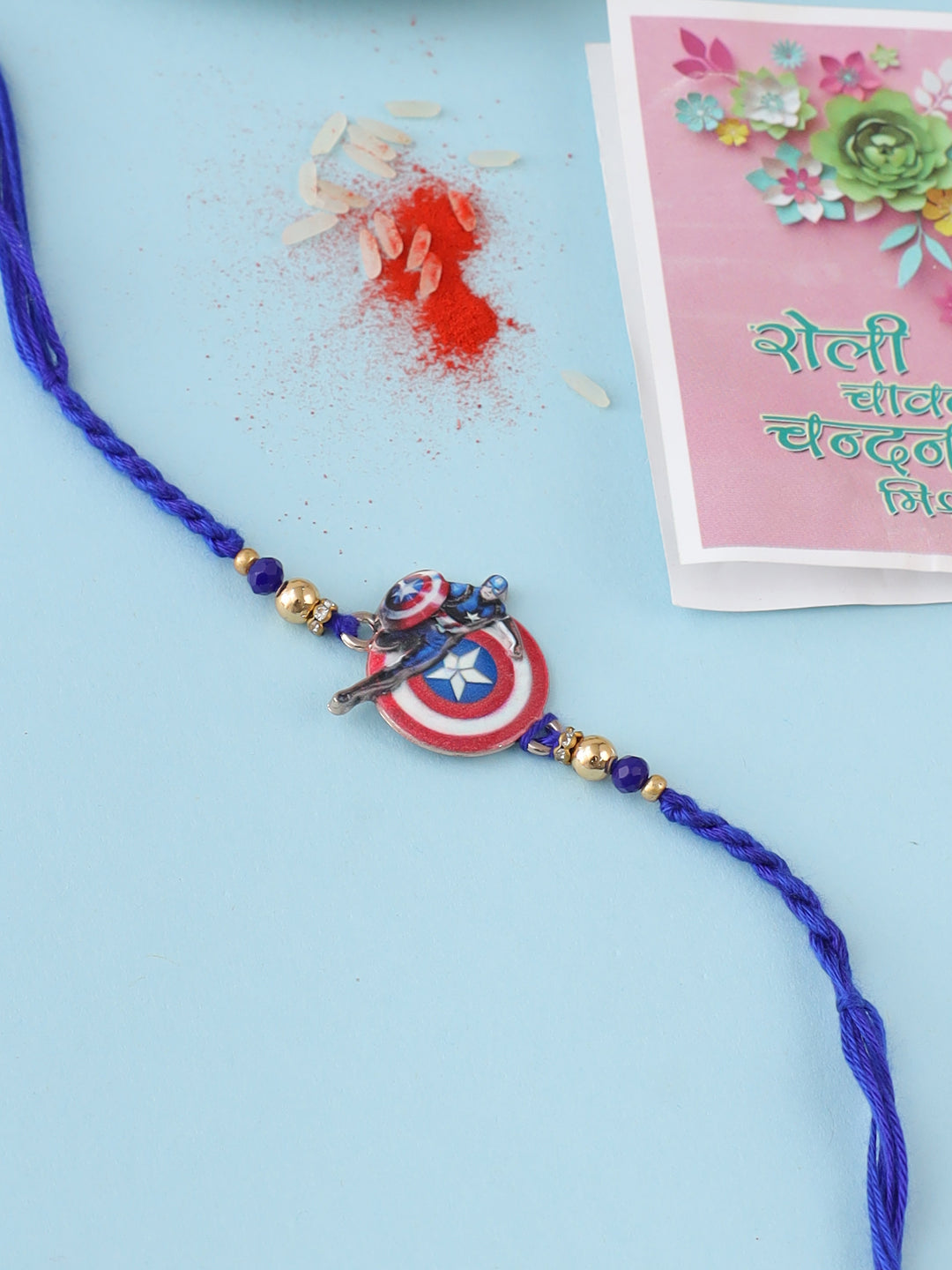 NVR Kids Superhero Blue Artificial Beads Thread Rakhi with Roli Chawal Chandan & Mishri