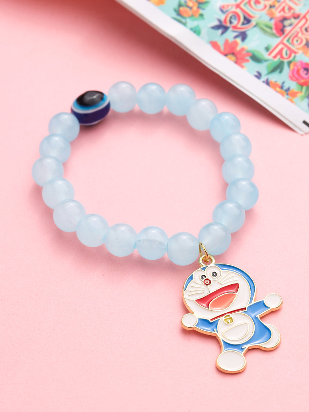 NVR Kids Cartoon Design Sky BLue Artificial Beads Thread Rakhi with Roli Chawal Chandan & Mishri