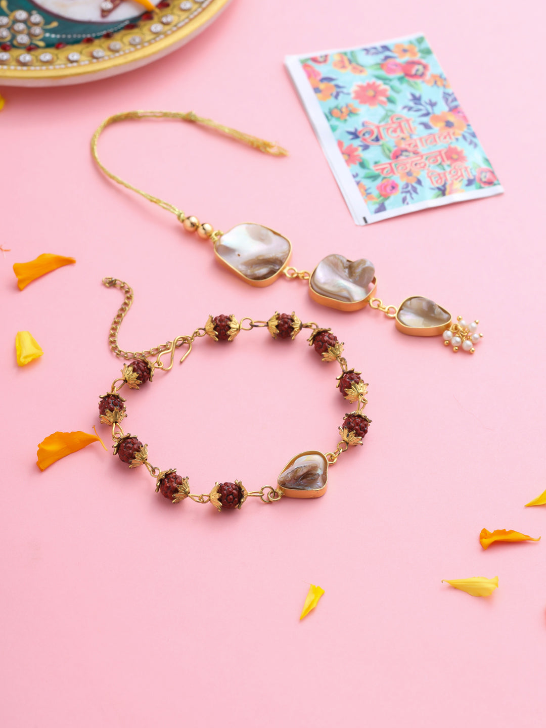 NVR Set of 2 Gold Toned Rudraksh & Pearls Bhaiya Bhabhi Rakhi with Roli Chawal Chandan & Mishri