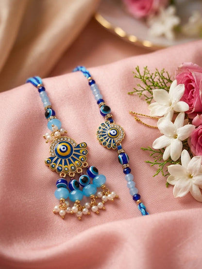 NVR Set of 2 Blue Evil Eye Artificial Beads Bhaiya Bhabhi Rakhi With Roli Chawal
