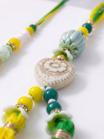 NVR Set of 2 Green & Yellow Beaded Heart Shape Bhaiya Bhabhi Rakhi with Roli Chawal
