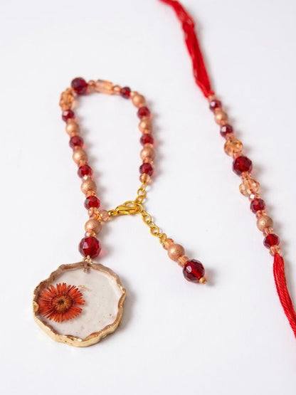 NVR Set of 2 Gold Toned Red Artificial Beads Bhaiya Bhabhi Rakhi With Roli Chawal Chandan