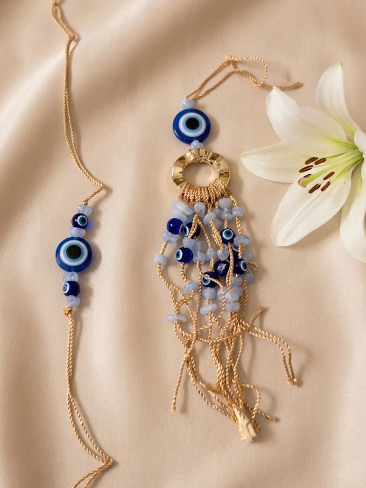 NVR Set of 2 Gold Toned Round Evil Eye Bhaiya Bhabhi Rakhi with Roli Chawal Chandan Mishri