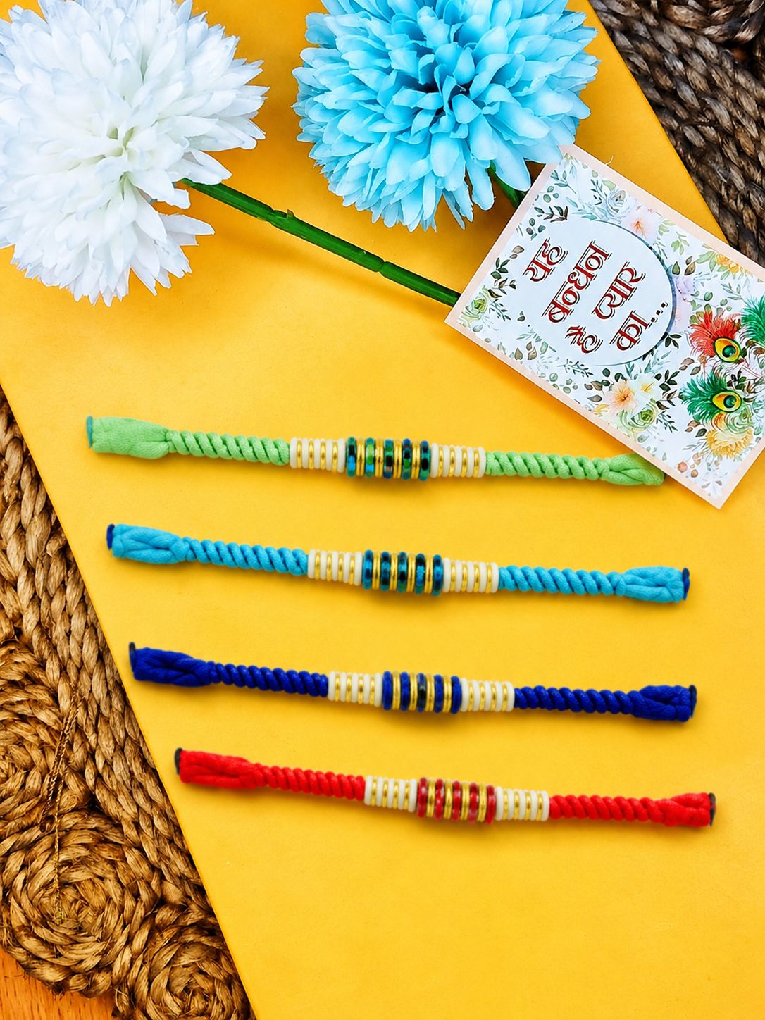 NVR Set of 4 Multicolor Artificial Beads Thread Rakhi with Roli Chawal Chandan Mishri