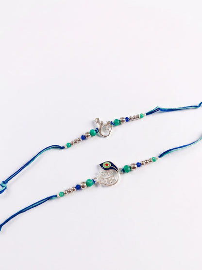 NVR Set of 2 Silver Toned Beaded Religious Thread Rakhi with Roli Chawal Chandan Mishri