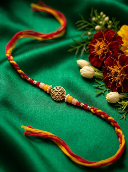 NVR Artificial Beads Decorative Om Design Religious Thread Rakhi with Roli Chawal Chandan