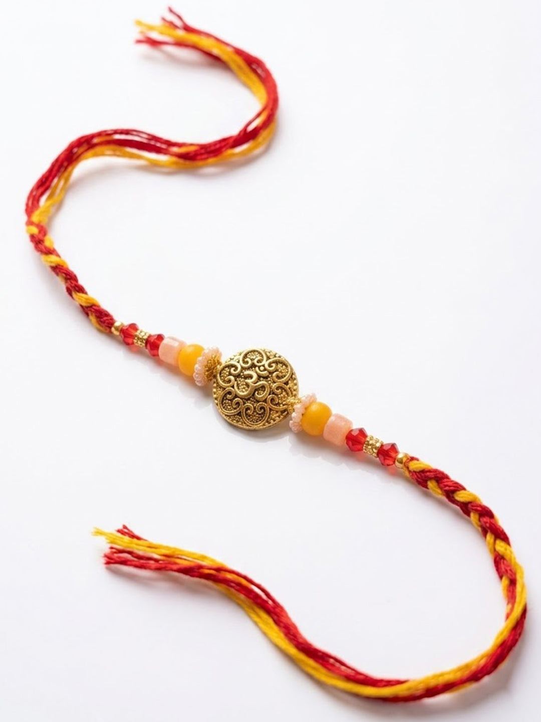 NVR Artificial Beads Decorative Om Design Religious Thread Rakhi with Roli Chawal Chandan
