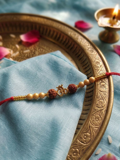 NVR Om Design Rudraksh Thread Rakhi with Roli Chawal Chandan Mishri