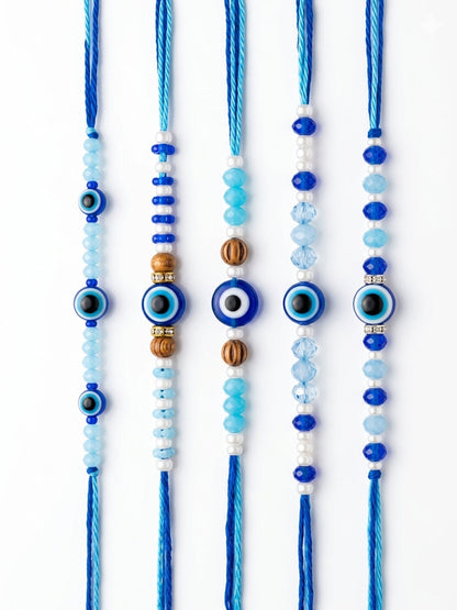NVR Set of 5 Blue Evil Eye Thread Rakhi with Roli Chawal Chandan Mishri