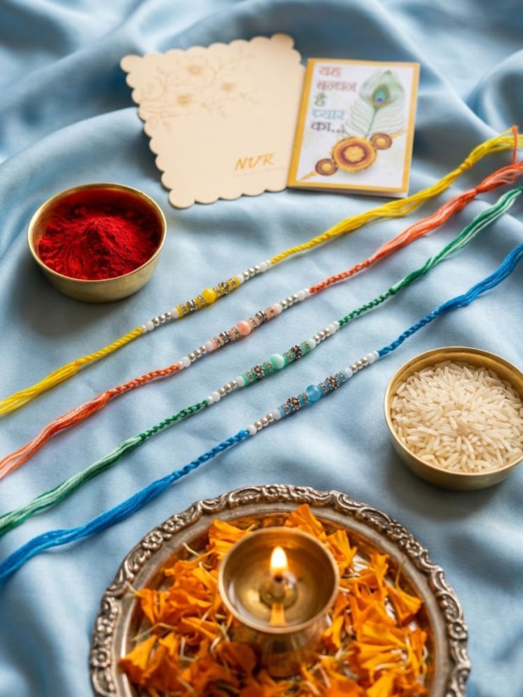 NVR Set of 4 Multicolor Artificial Beads Thread Rakhi with Roli Chawal Chandan Mishri