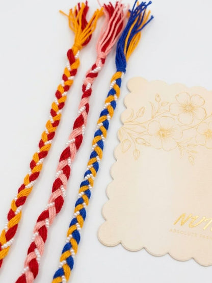 NVR Set of 3 Multicolor Thread Rakhi with Roli Chawal Chandan Mishri