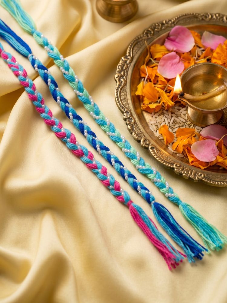 NVR Set of 3 Multicolor Thread Rakhi with Roli Chawal Chandan Mishri