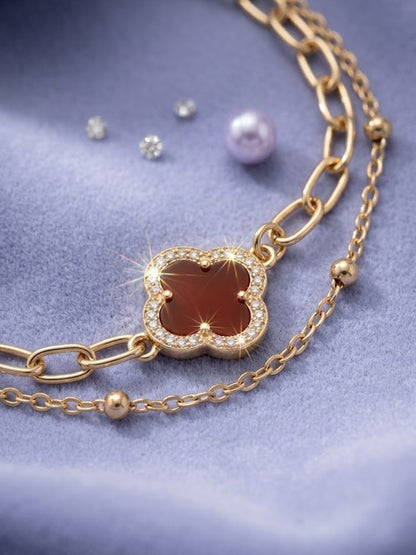 NVR Women Artrificial Stones Gold Plated Rakhi with Roli Chawal Chandan Mishri