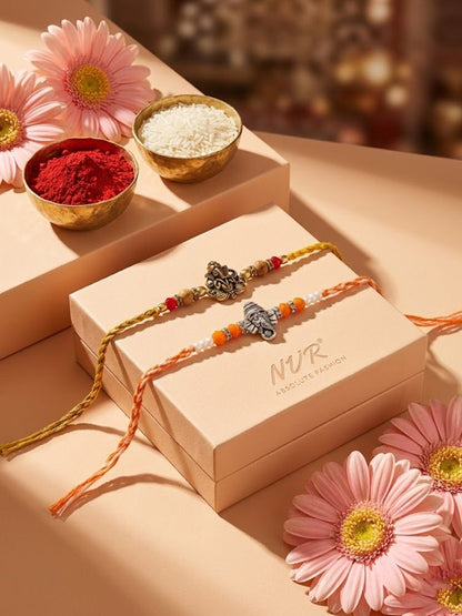 NVR Set of 2 Multicolor Religious Thread Rakhi with Roli Chawal Chandan Mishri