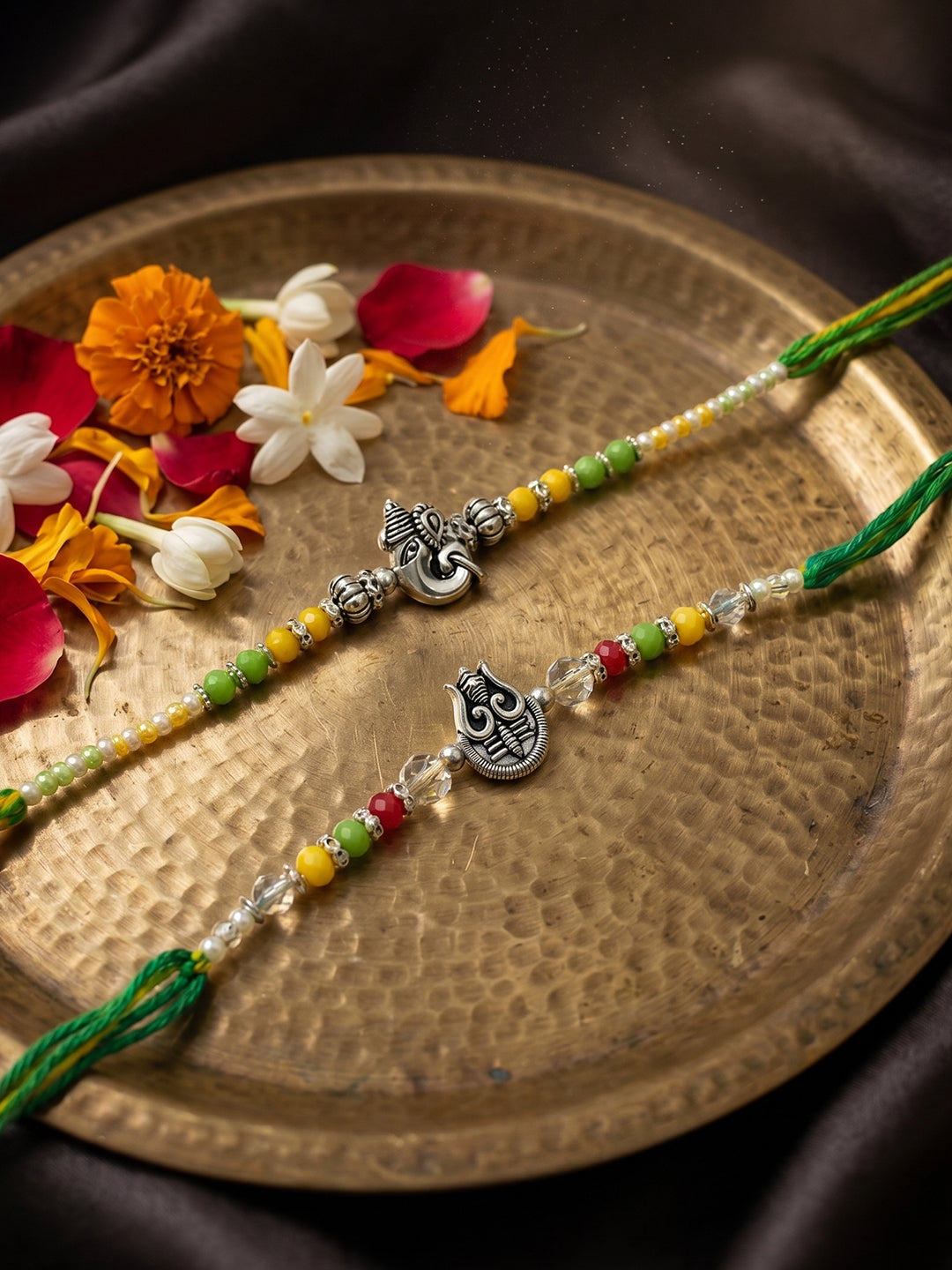 NVR Set of 2 Multicolor Religious Thread Rakhi with Roli Chawal Chandan Mishri