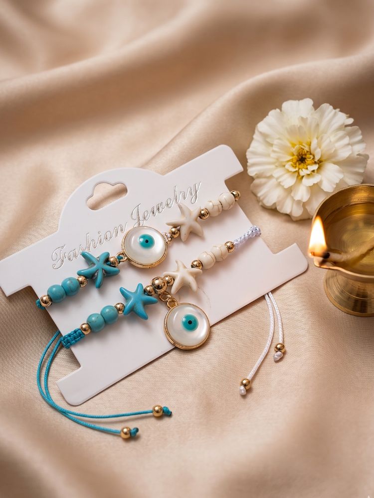 NVR Set of 2 Blue Evil Eye & White Pearl Bhaiya Bhabhi Rakhi with Roli Chawal Chandan