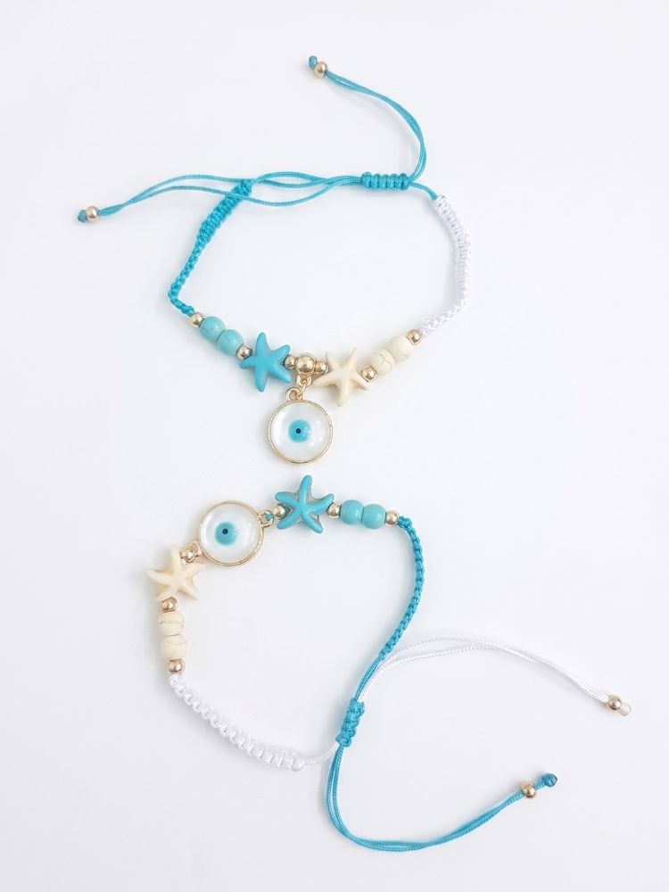 NVR Set of 2 Blue Evil Eye & White Pearl Bhaiya Bhabhi Rakhi with Roli Chawal Chandan