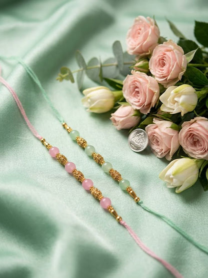 NVR Set of 2 Pink & Green Artificial Beads Thread Rakhi With Roli Chawal Chandan Mishri