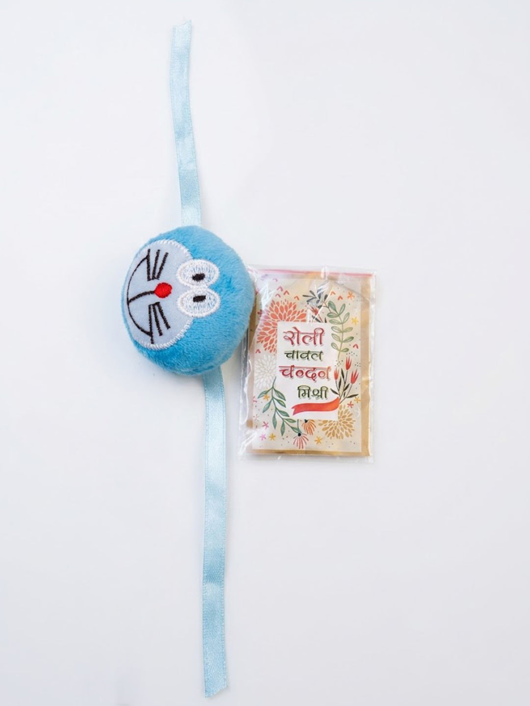 NVR Kids Doremon Design Thread Rakhi With Roli Chawal Chandan Mishri