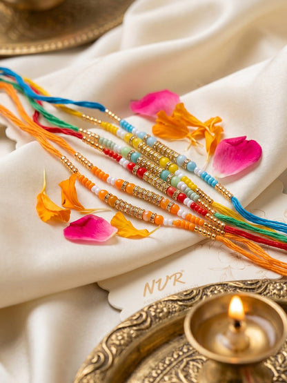 NVR Set of 6 Multi Artificial Beads Thread Rakhi with Roli Chawal Chandan Mishri