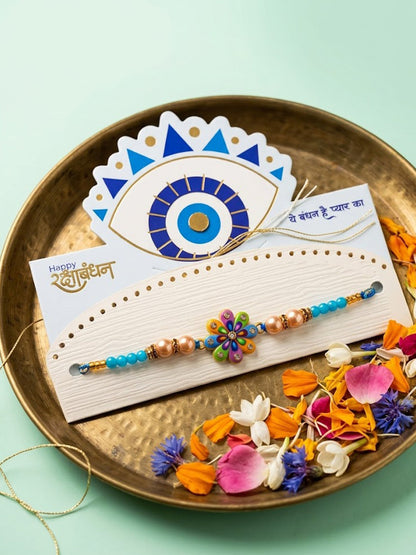 NVR Artificial Beads Flower Shape Multicolor Thread Rakhi with Roli Chawal Chandan Mishri