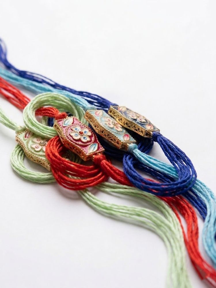 NVR Set of 4 Multicolor Heart Shape Thread Rakhi with Roli Chawal Chandan Mishri