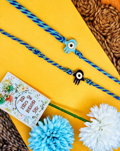 NVR Set of 2 Evil Eye & Blue Thread Rakhi with Roli Chawal Chandan Mishri