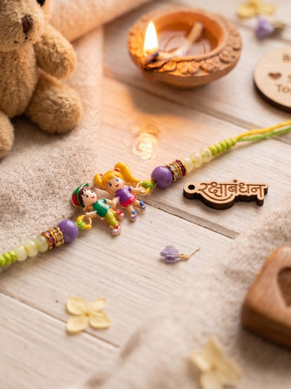 NVR Kids Multicolor Artificial Beads Thread Rakhi with Roli Chawal Chandan Chandan Mishri