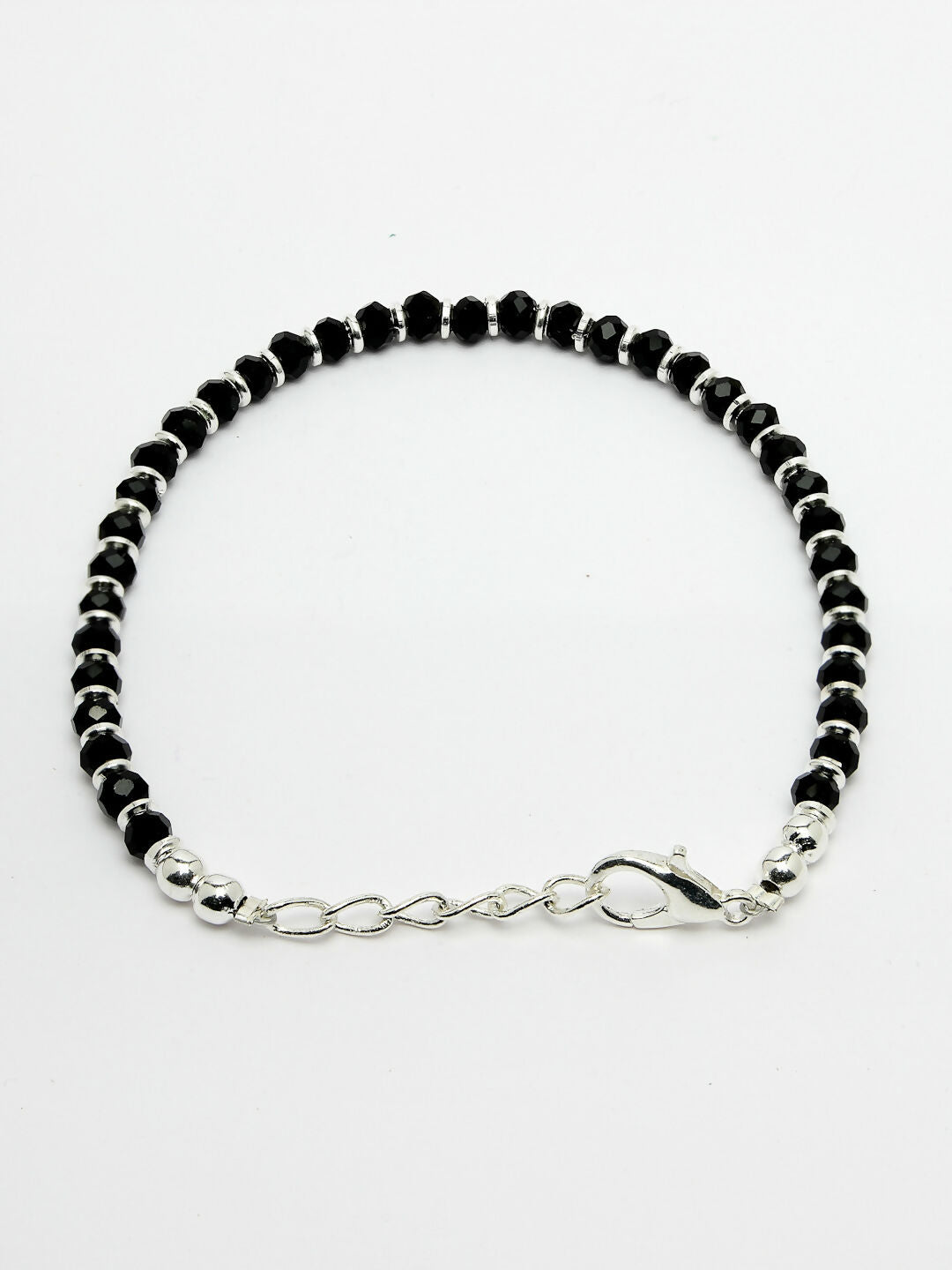NVR Women Silver Plated Black Beaded Adjustable Rakhi With Roli Chawal