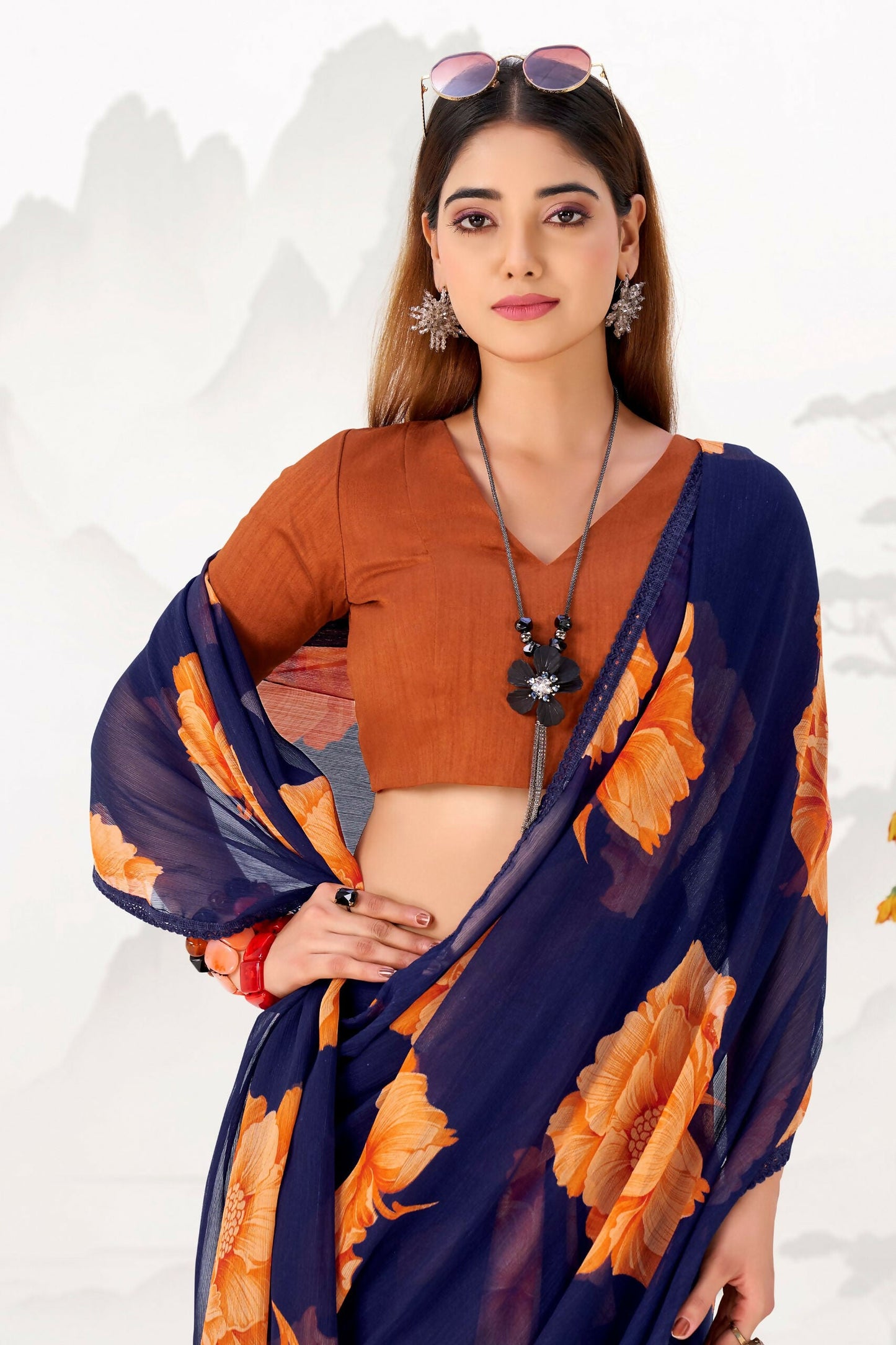 Vastranavya Navy Blue Floral Print with Lace Border work Chiffon Saree & Unstitched Blouse