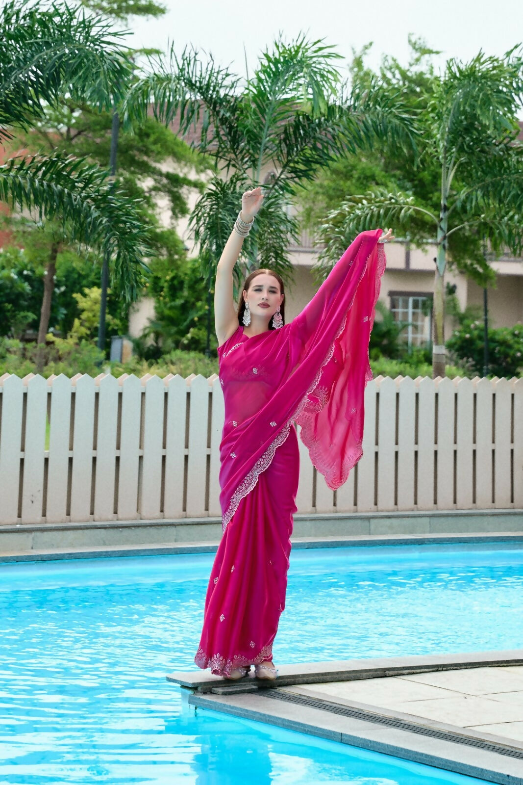 Vastranavya Pink Embroidery Work Shimmer Chiffon Saree with Unstitched Blouse
