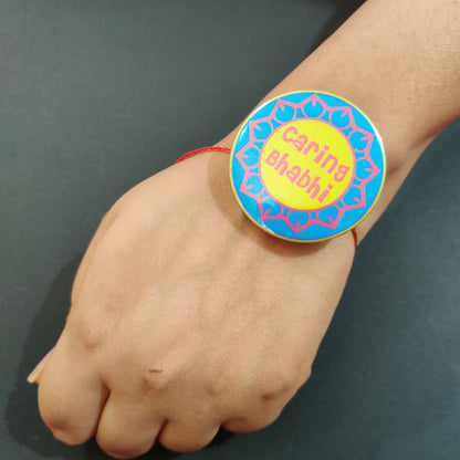 Indianvibez Caring Bhabhi Metal Rakhi/Lumba with Fridge Magnet - Kids Rakhi