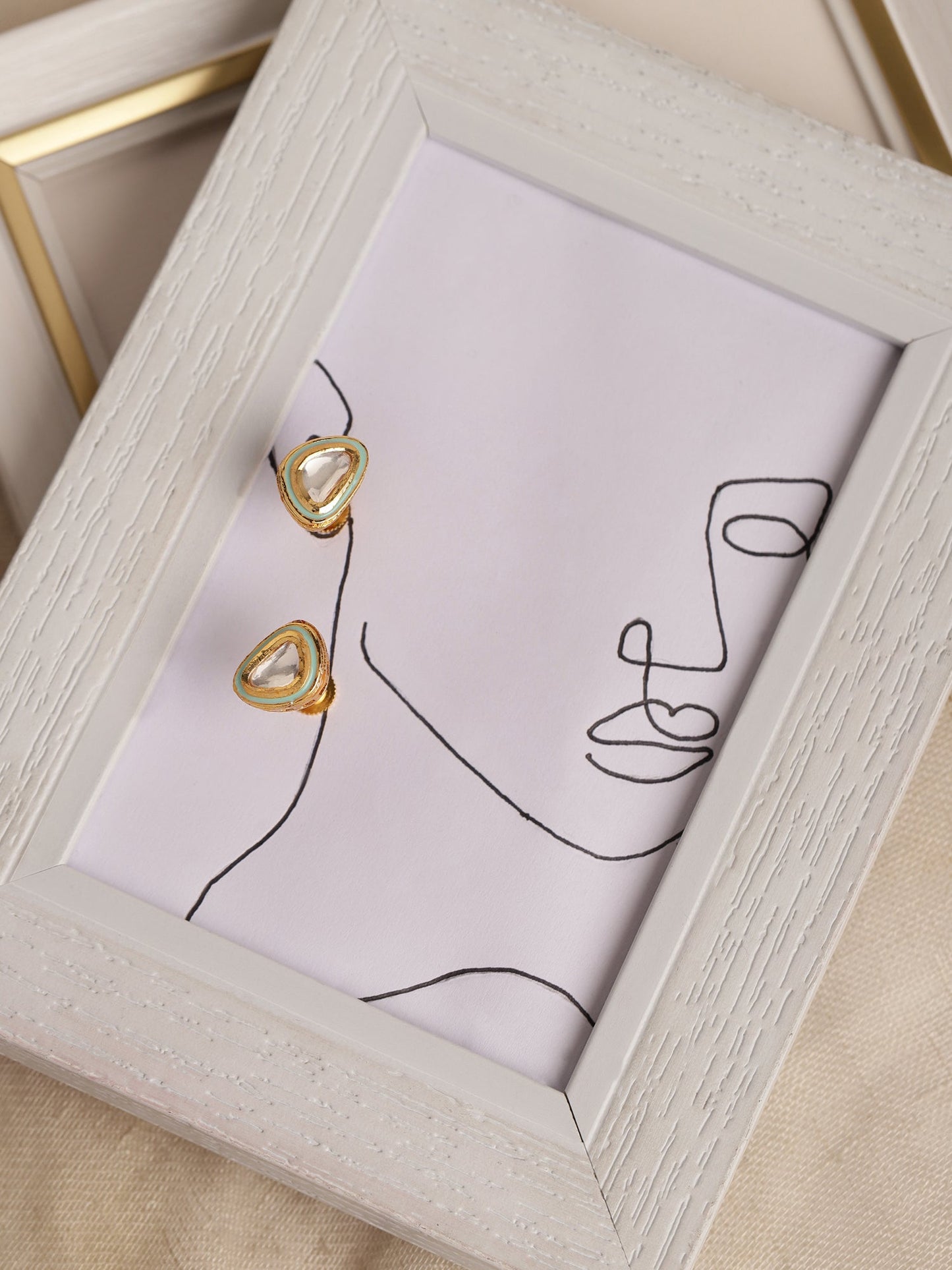 Gold-Polished Triangular Kundan Studded Studs Earrings - Ruby Raang