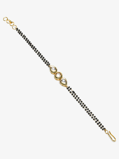 Black Gold-Toned Kundan Bracelet Mangalsutra - Ruby Raang