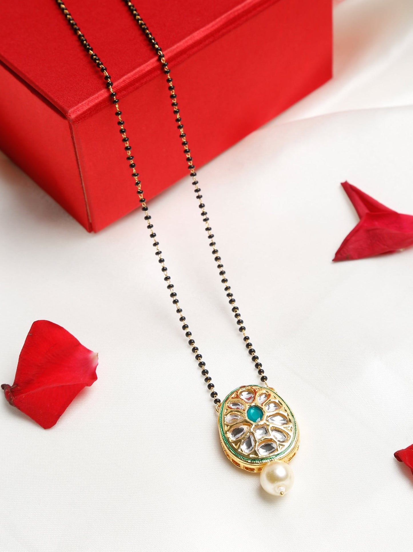 Black Gold-Polished Kundan Mangalsutra - Ruby Raang