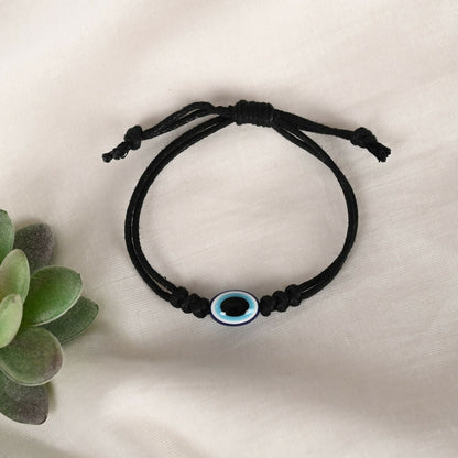 NVR Women & Men Black Evil Eye Rakhi With Roli Chawal