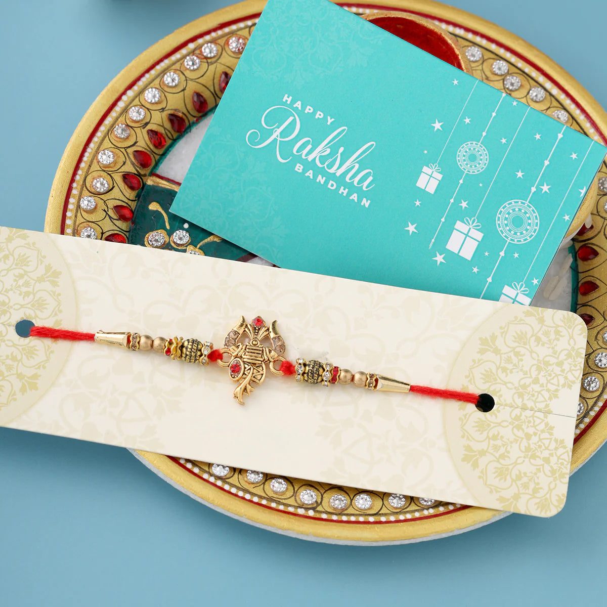 trueBrowns X Voylla Designer Ganesha Rakhi With Roli Chaawal Pack