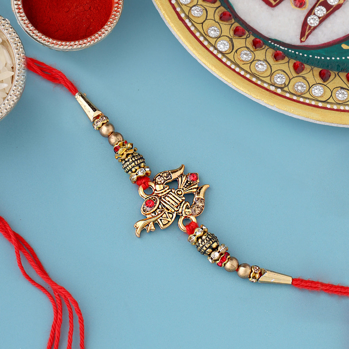 trueBrowns X Voylla Designer Ganesha Rakhi With Roli Chaawal Pack