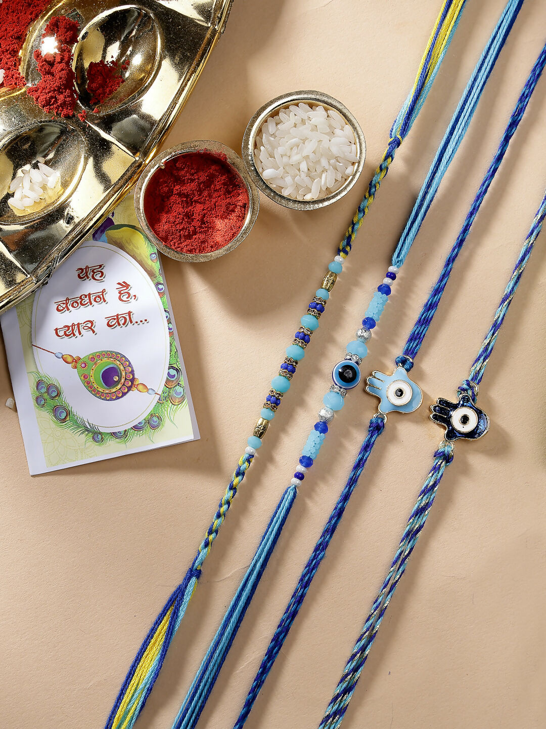 NVR Women & Men Set of 4 Blue Evil Eye Charm Rakhi With Roli Chawal