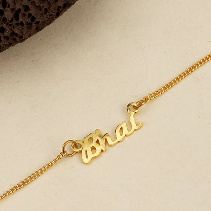 trueBrowns X Voylla Gold-Toned 'Bhai' Bracelet Rakhi With Roli Chaawal Pack