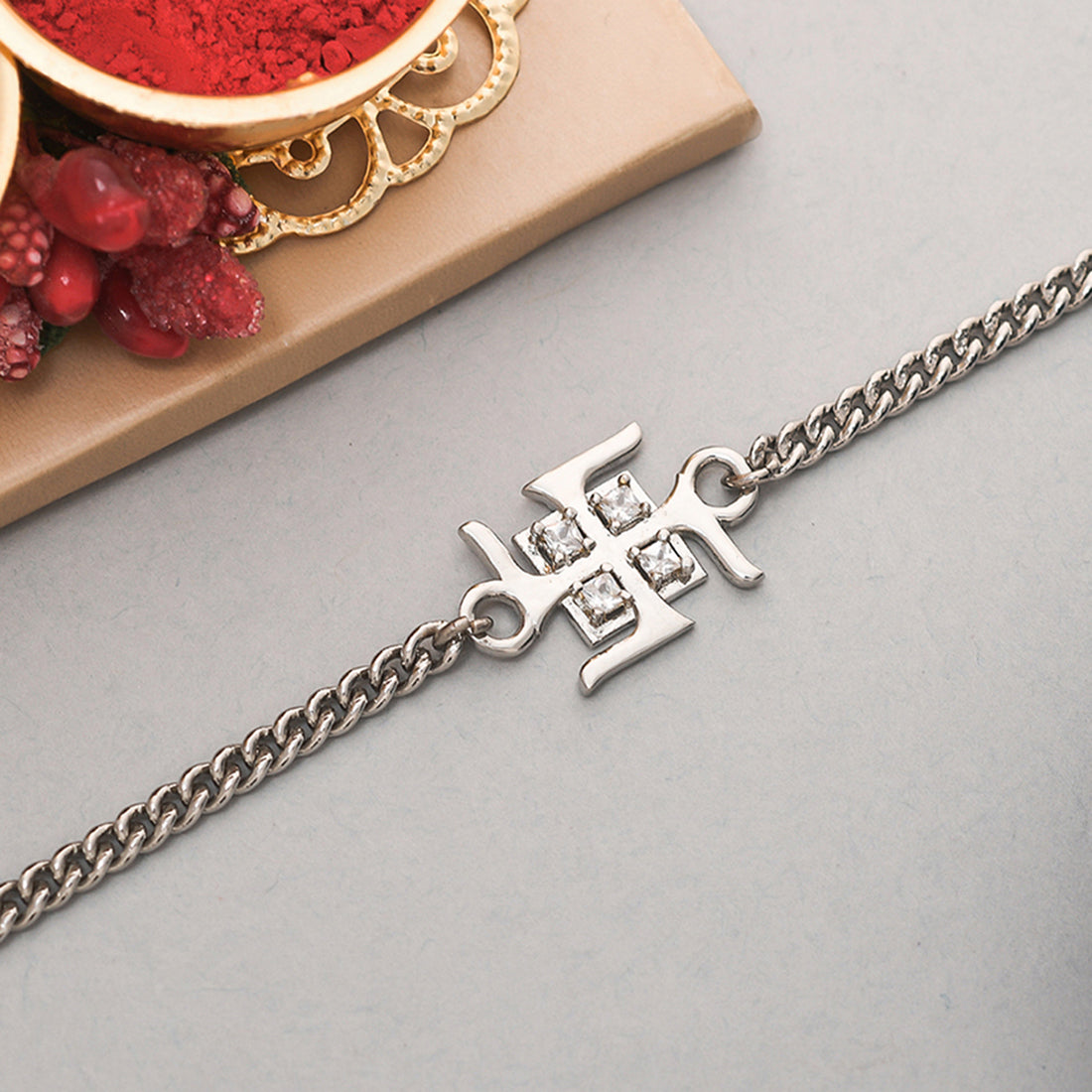 trueBrowns Auspicious Swastik Motif Silver Tone Bracelet Rakhi