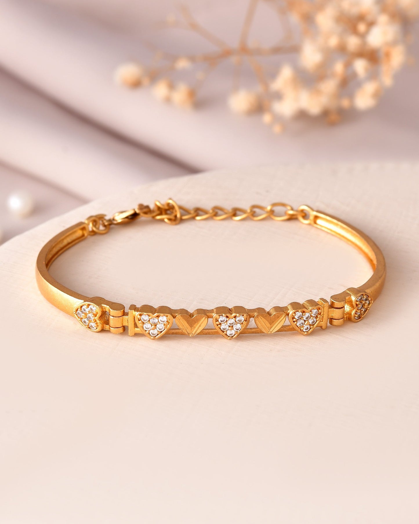 VOJ Women Gold Polished Heart Shaped Stone Studded Link Bracelet