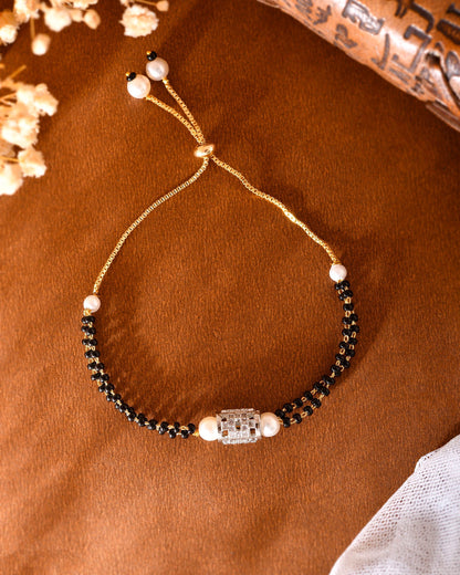 VOJ Silver Plated AD Stone Studded Cylindrical Shaped Mangalsutra Bracelet