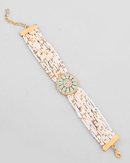 VOJ Gold-Polished Green Flower Studded And Beaded Mutli Layer Bracelet