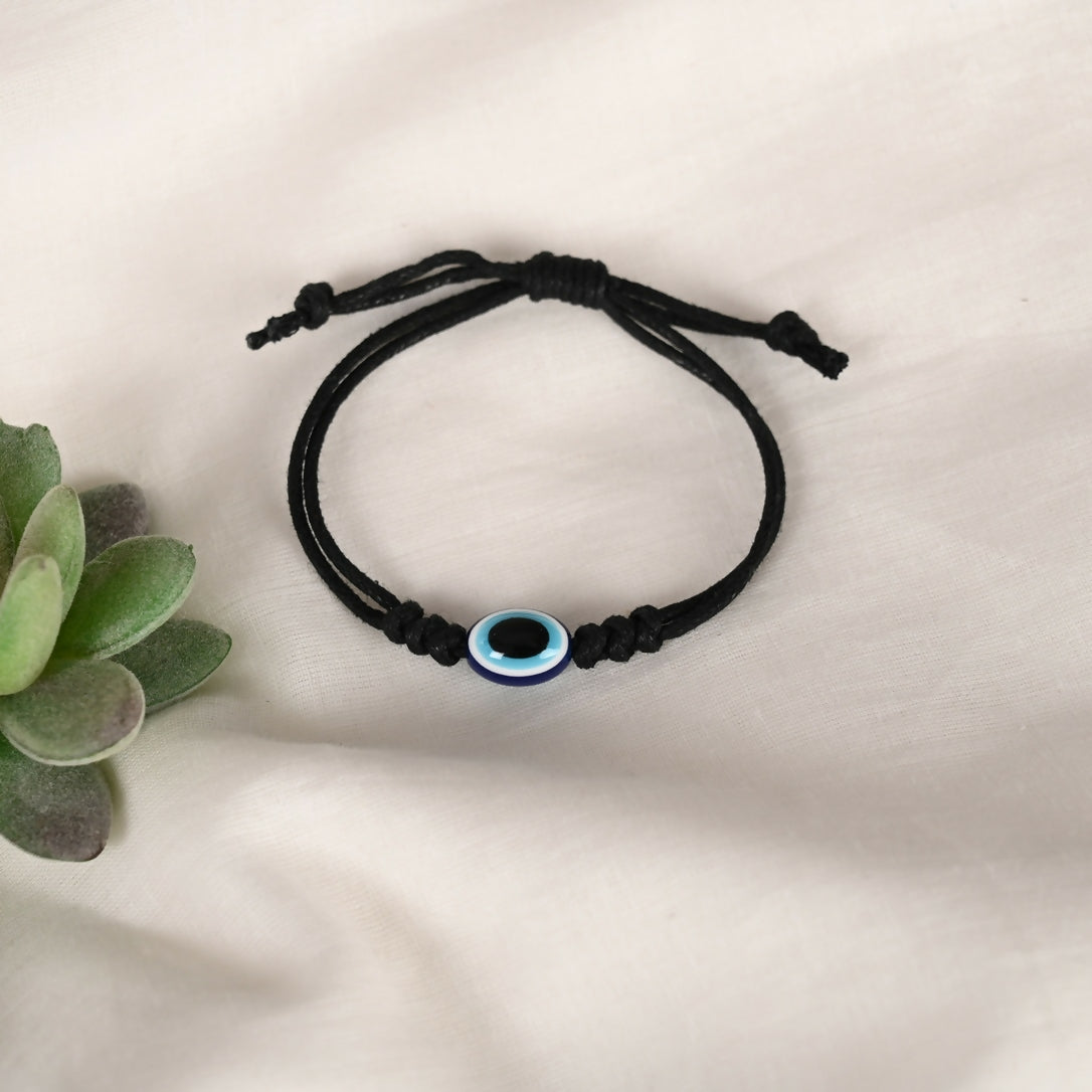 NVR Women & Men Black Evil Eye Rakhi With Roli Chawal